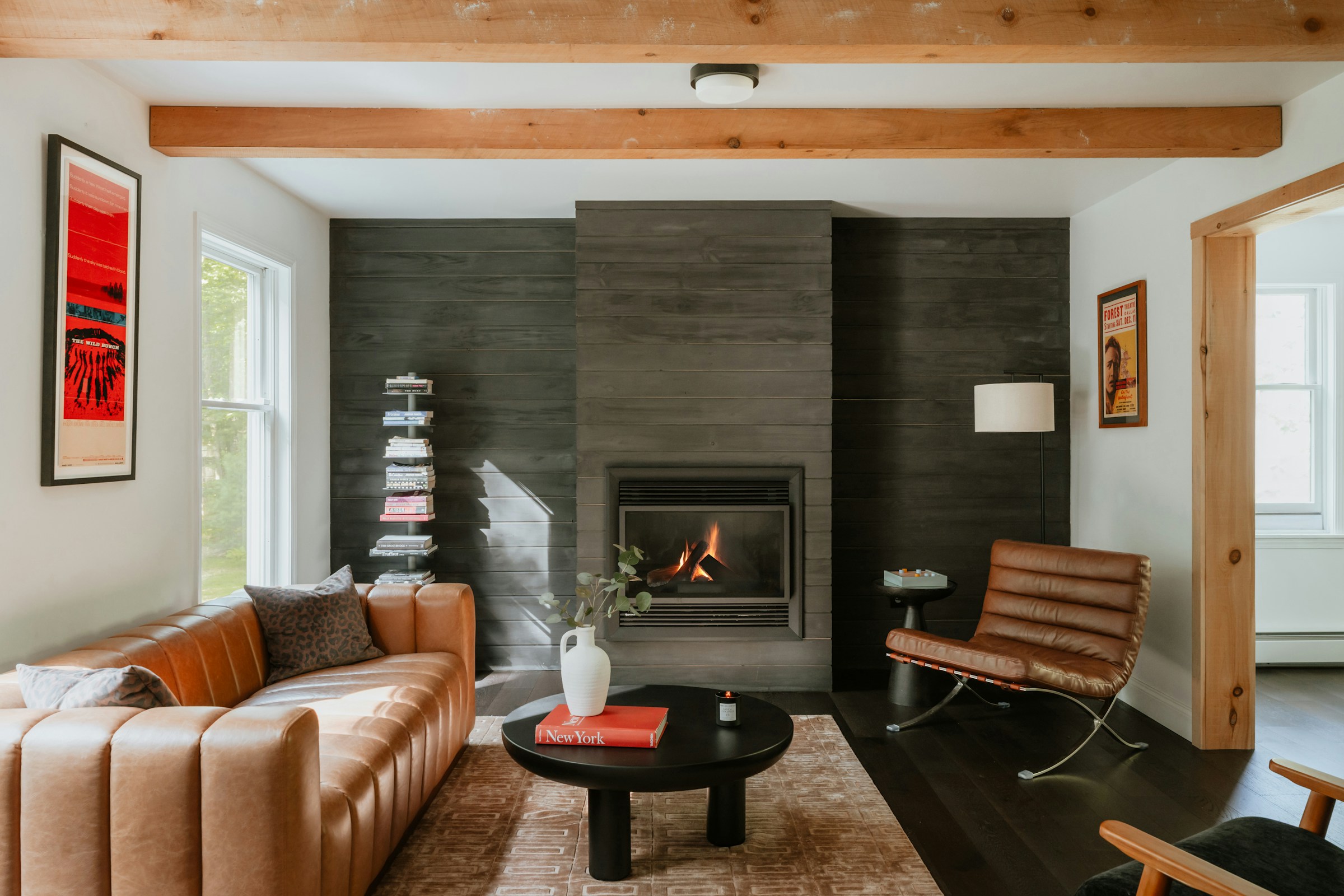 A study interior with leather seating and warm light