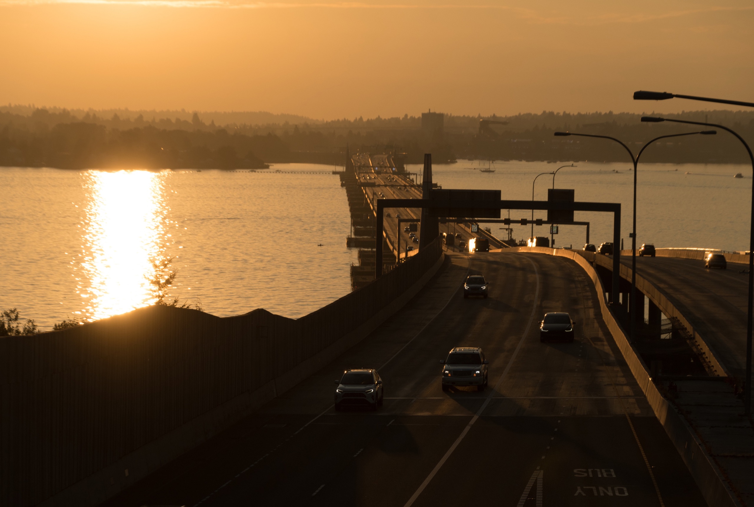 Lake Washington at dusk with the SR-520 floating bridge